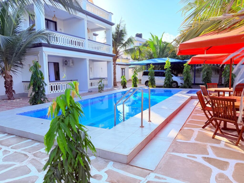 Pool and patio from poolside angle