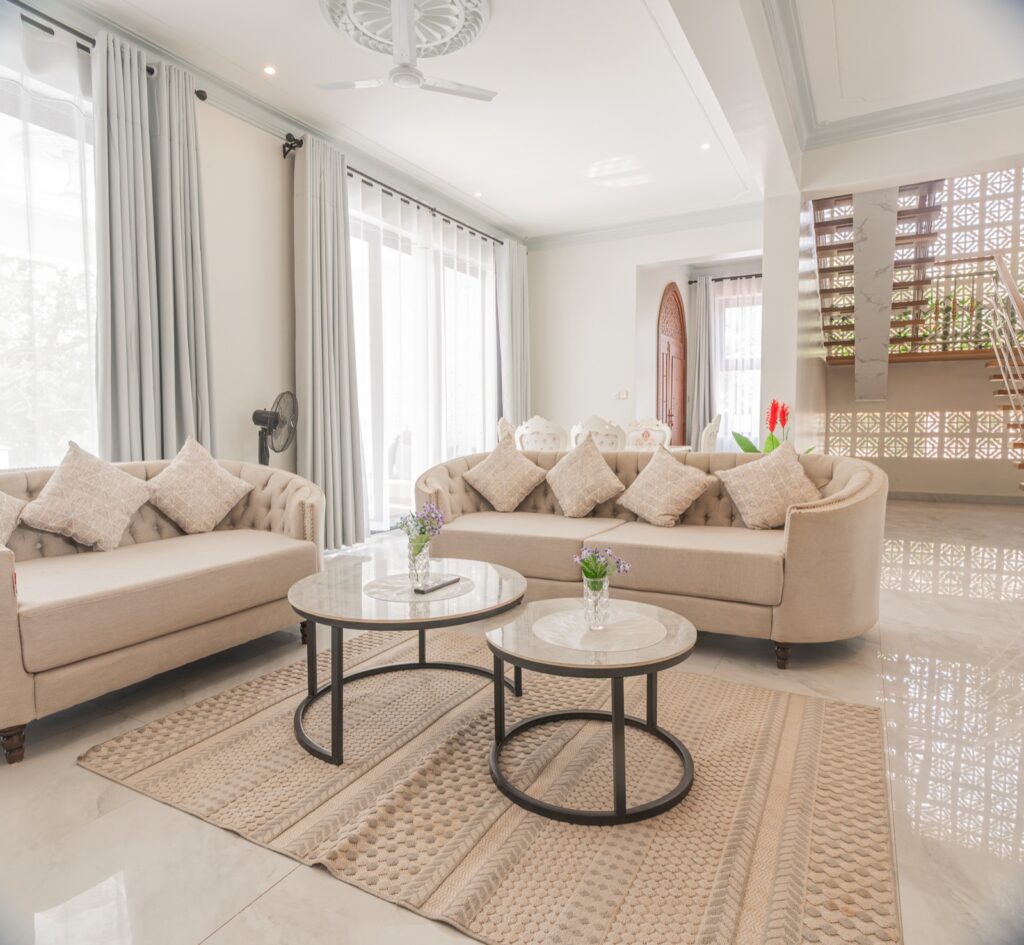 Open-plan living area with lattice staircase